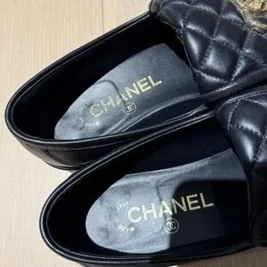 CHANEL Black Loafers with Gold Logo